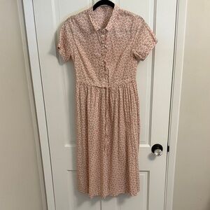 Beautiful Pink Floral Midi Dress. Pockets, covered buttons, ruffle
